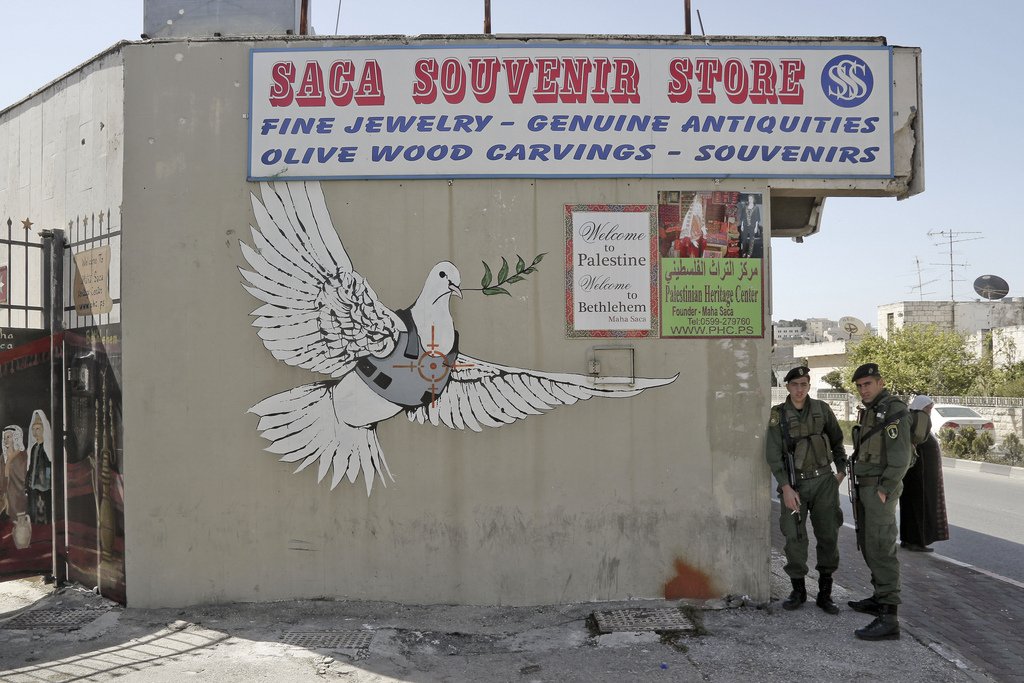 bansky-peace-dove-in-bullet-proof-vest-welcome-to-palestine